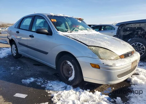 2004 Ford Focus Lx z USA, uszkodzony, nr VIN 1FAFP33P44W166076